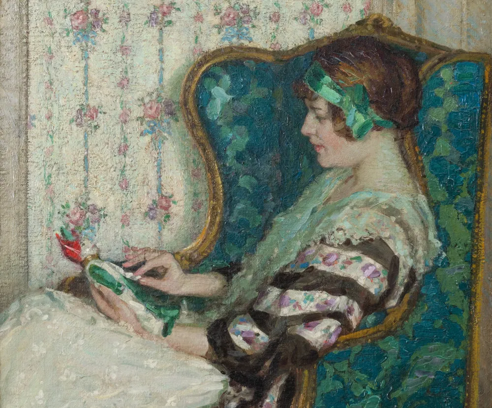 Henry Salem Hubbell (1870–1949). The Pied Mannequin, 1917. Oil on canvas, 26 x 18 1/2 in. (detail). Elegantly dressed woman sitting in front of a mantel holding a doll.